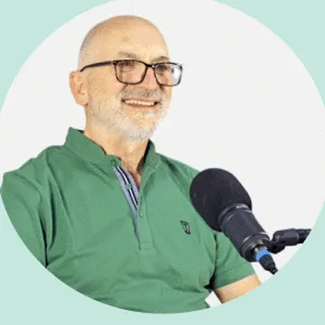 John O'Brien at a microphone, recording a session
